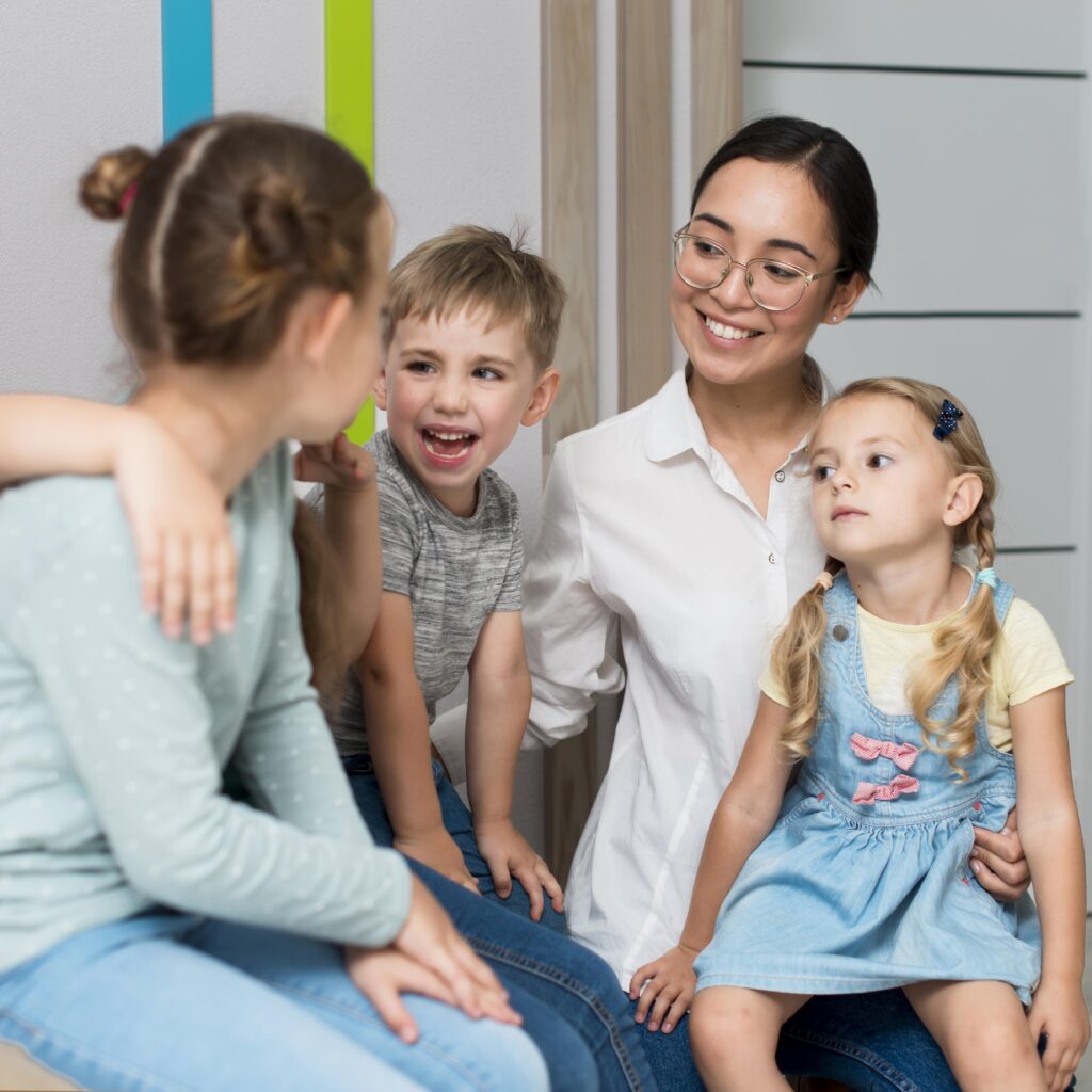 teacher talking with her students